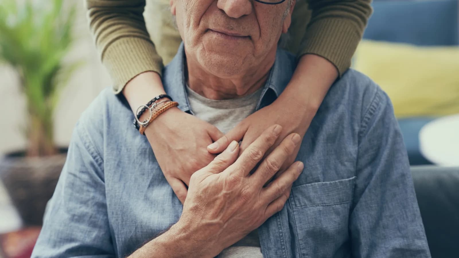 Elderly man and carer