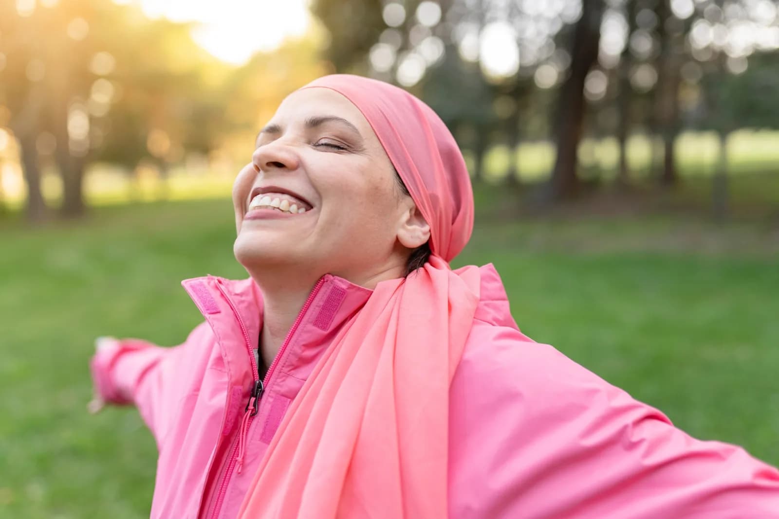 Woman smiling and enjoying the outdoors in the sunshine